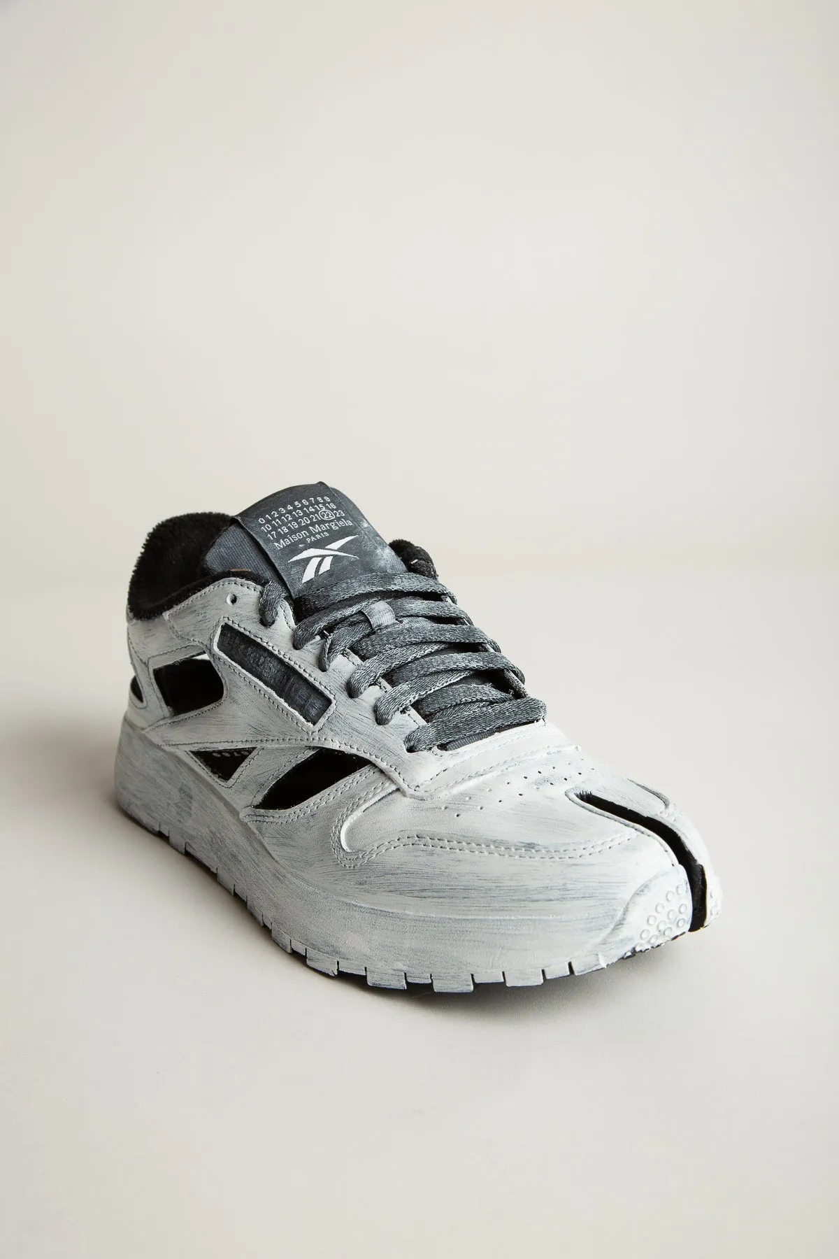 MAISON MARGIELA | REEBOK CLASSIC HANDPAINTED CUT OUT SNEAKERS