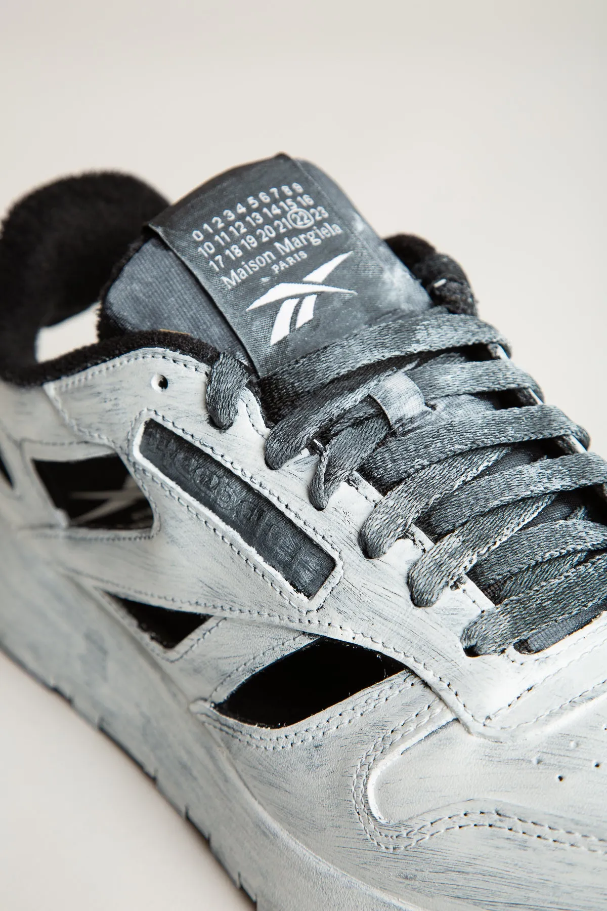 MAISON MARGIELA | REEBOK CLASSIC HANDPAINTED CUT OUT SNEAKERS