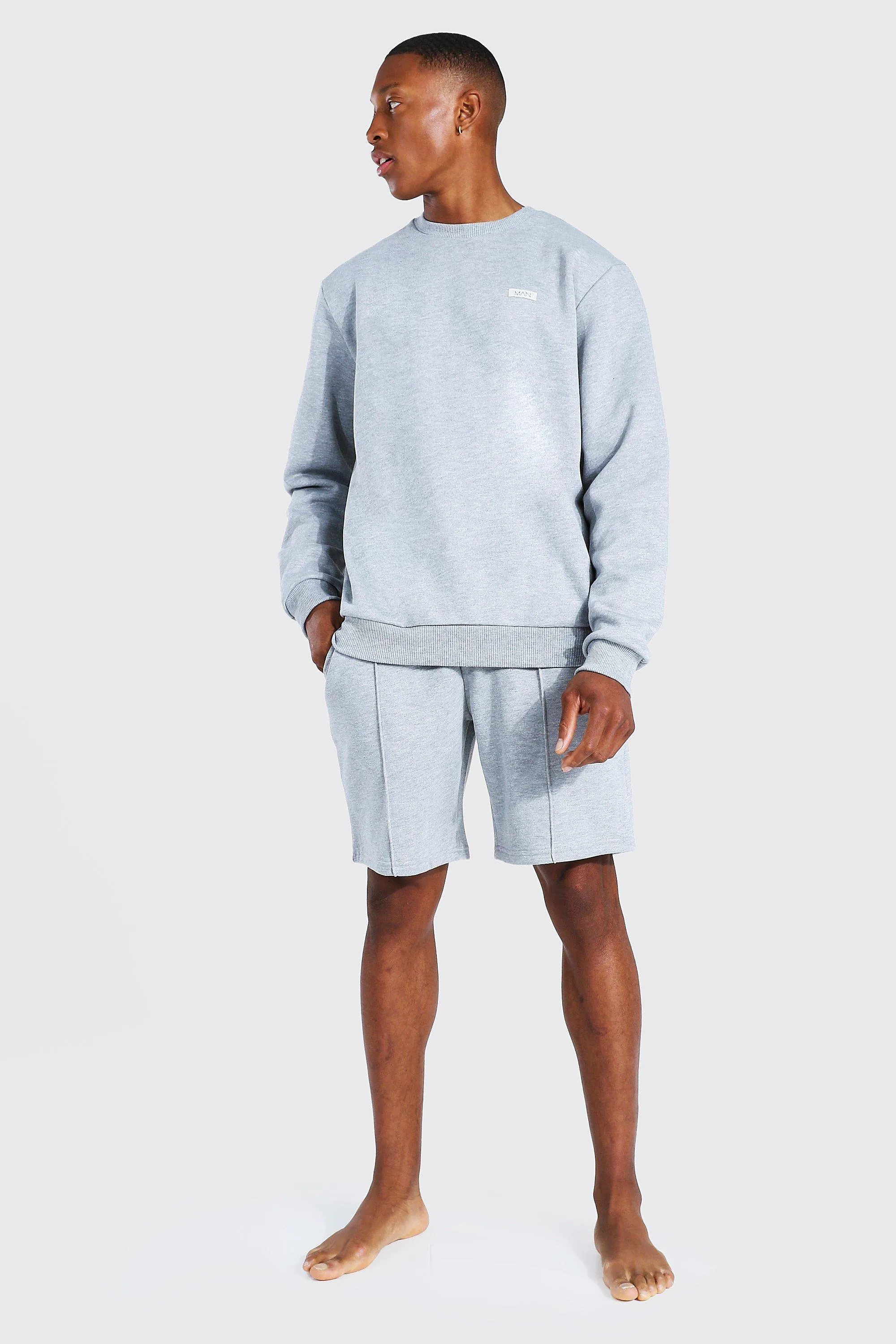 Man Woven Tab Sweater And Short Tracksuit